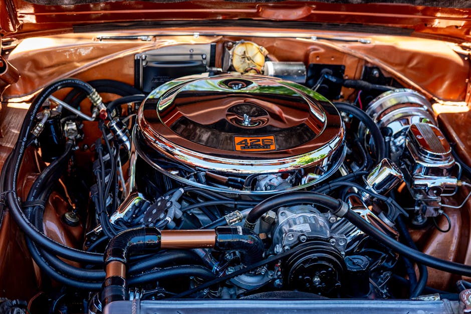 The powerful 427-cubic inch V8 engine of a 1964 Ford Fairlane Thunderbolt, showcasing its impressive performance capabilities