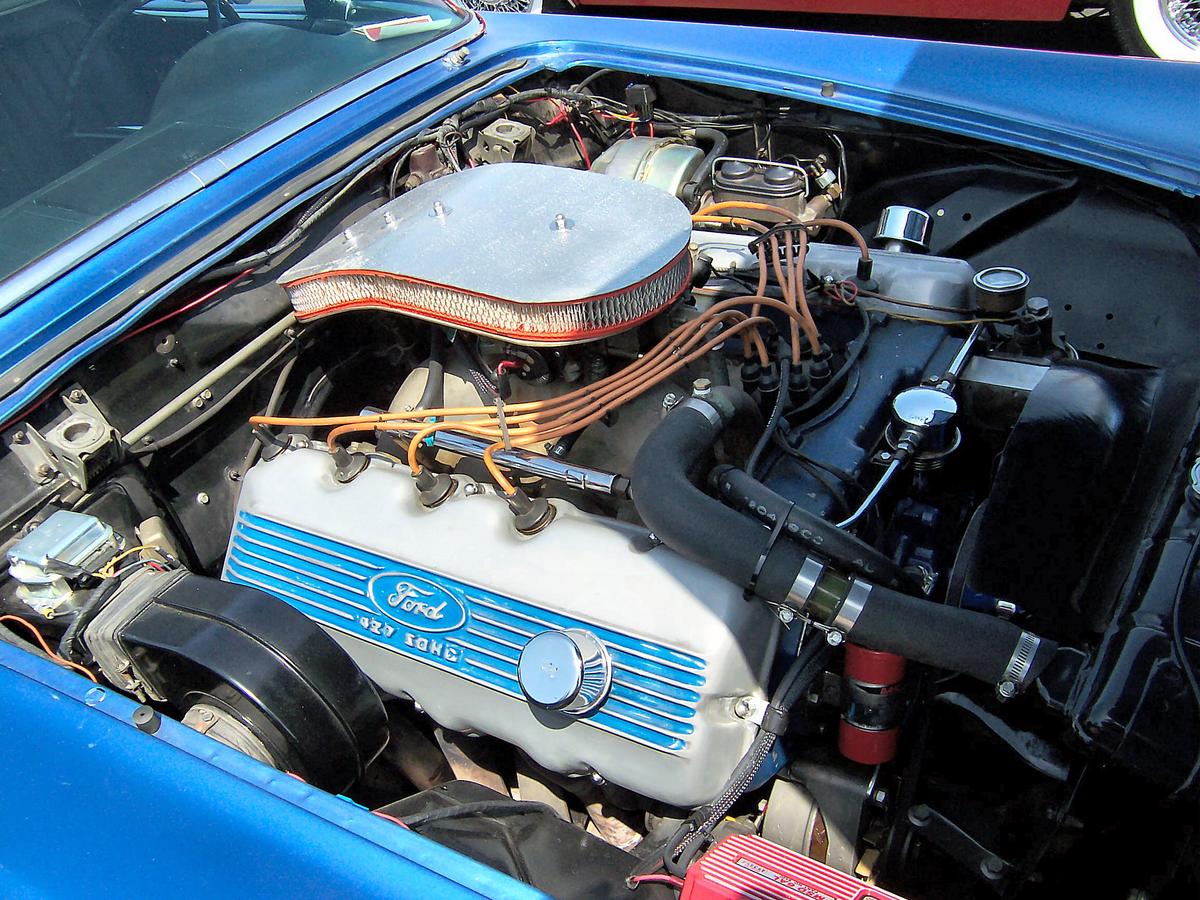 The powerful 427 cubic-inch V8 engine of a Ford Galaxie, showcasing its raw power and mechanical prowess