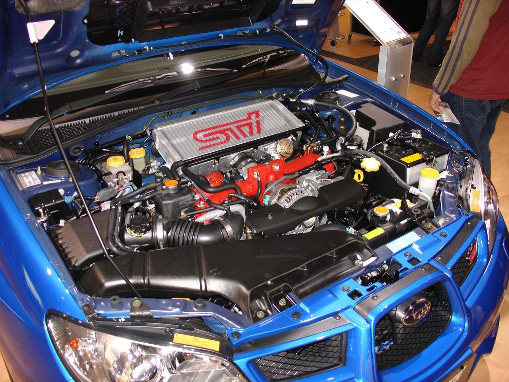 The turbocharged 2.0-liter flat-four engine of the 2002 Subaru Impreza WRX STi, showcasing its performance components